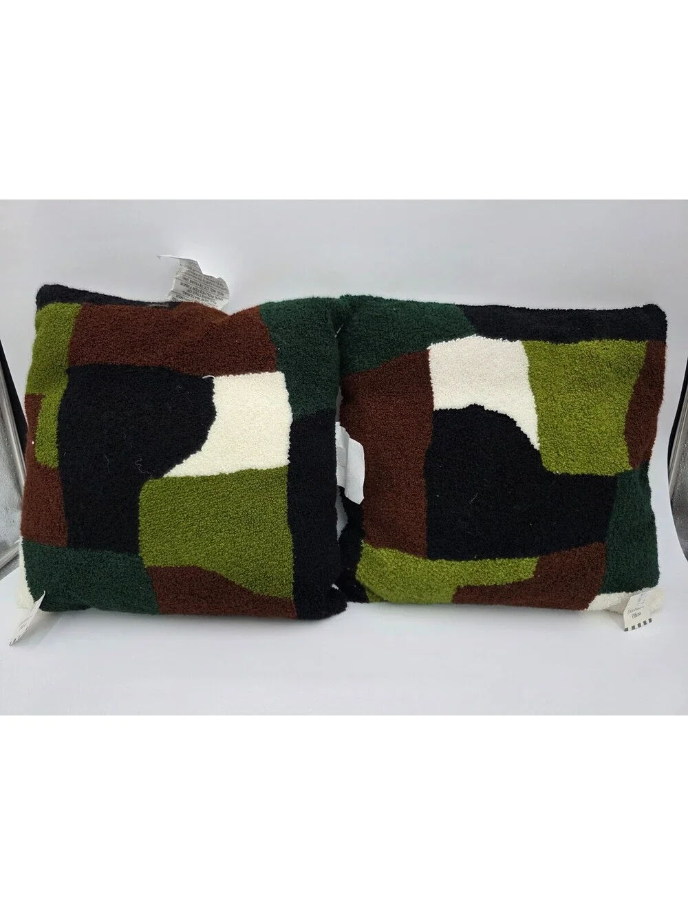 Pair of Geometric Patterned Throw Pillows in Green, Brown, Black, and Cream